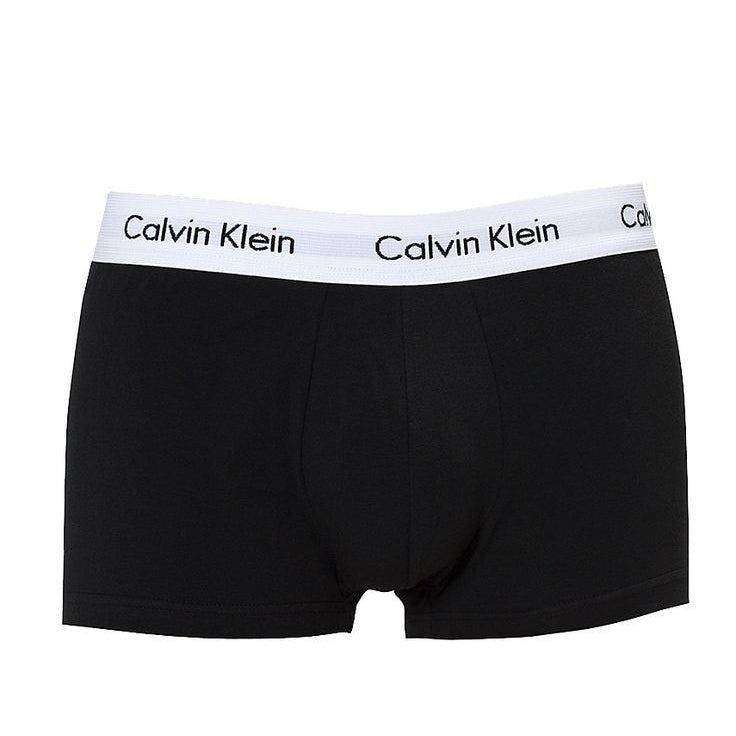Black Calvin Klein boxer briefs with white waistband on a white background