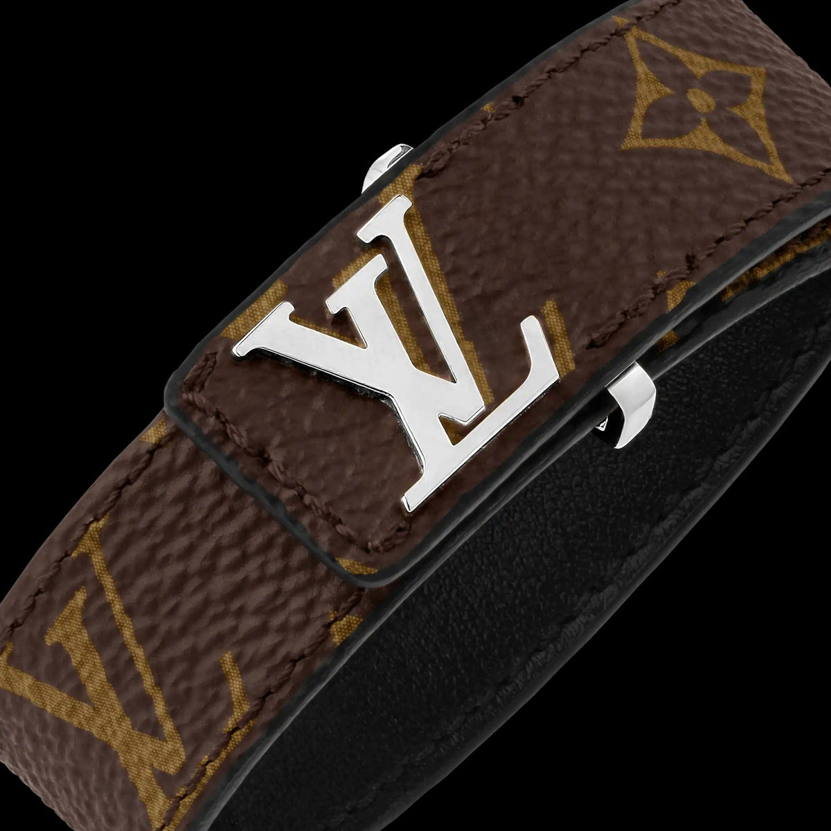 Louis Vuitton belt with monogram pattern on a white background