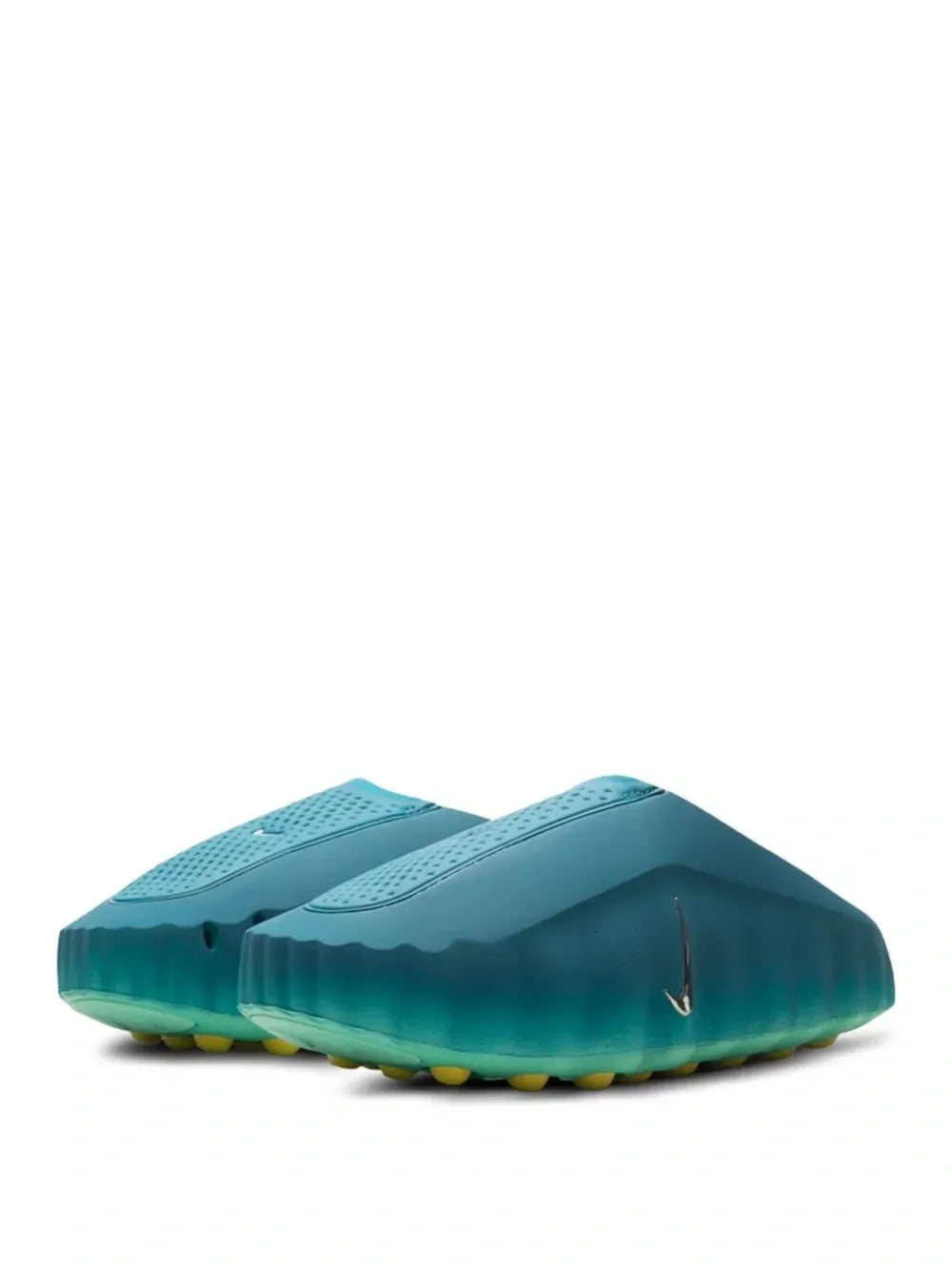Teal athletic shoes with a Nike logo on a white background
